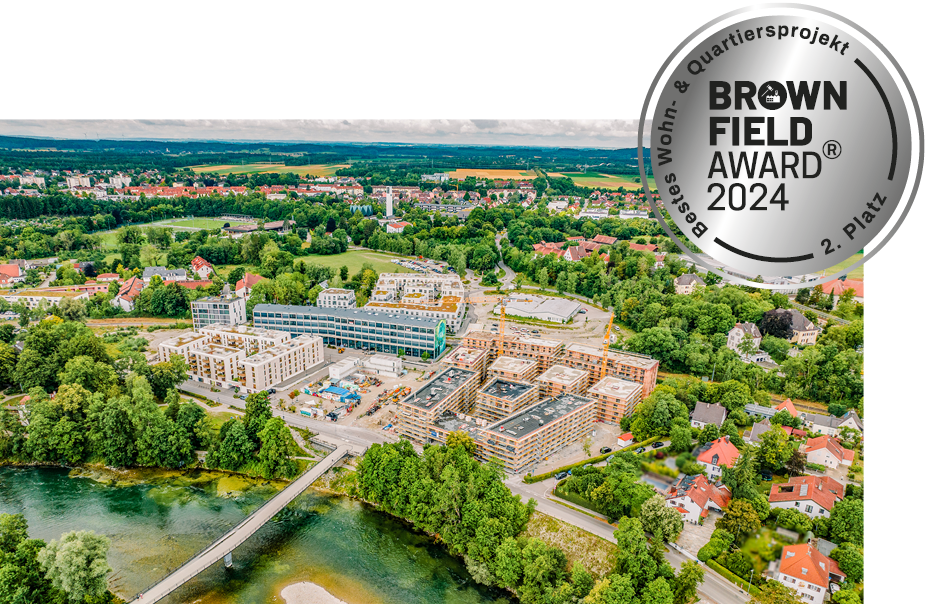 drohnenfoto des quartiers mit brownfiled award auszeichnung darauf