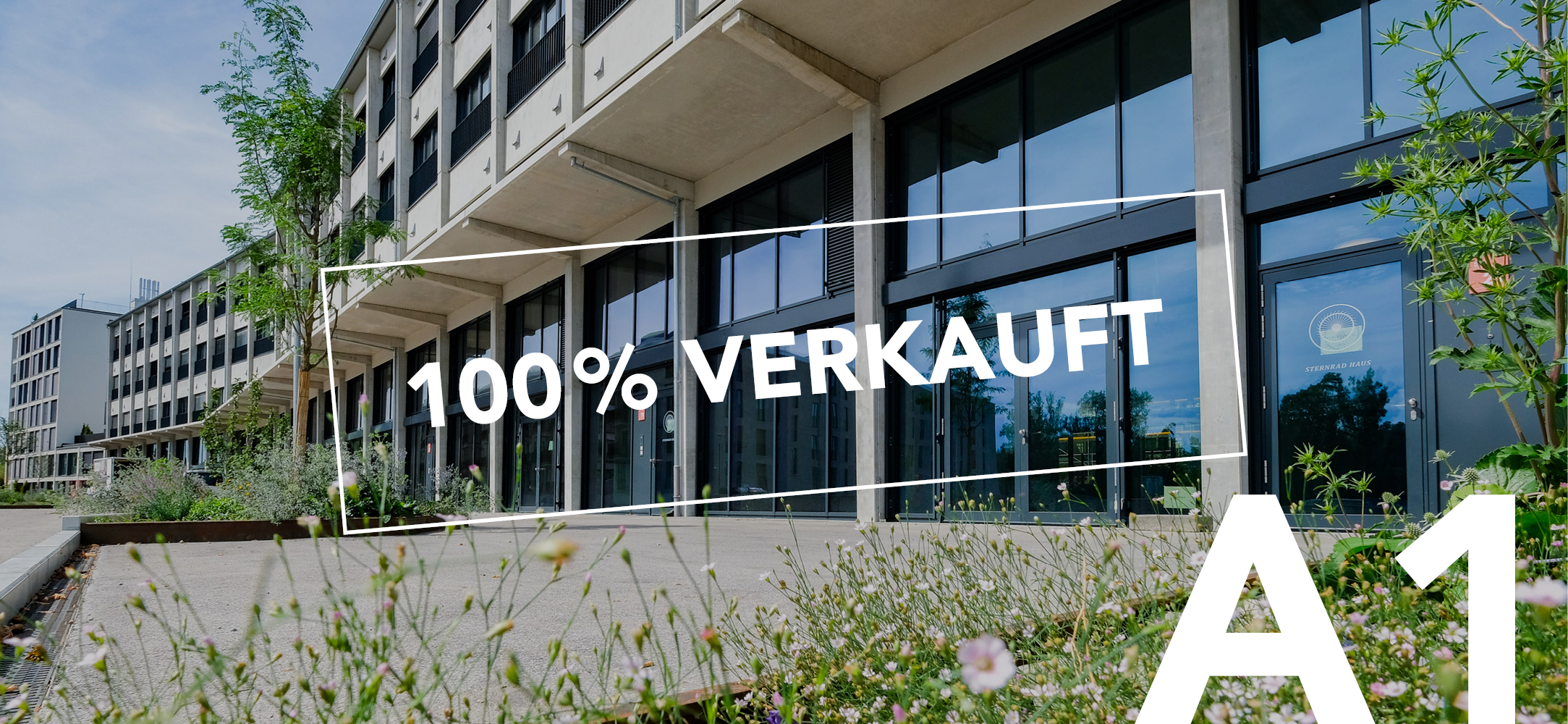 Foto vom Sternrad Haus mit A1 als Schriftzug im Eck und der Info, dass 100 % verkauft ist